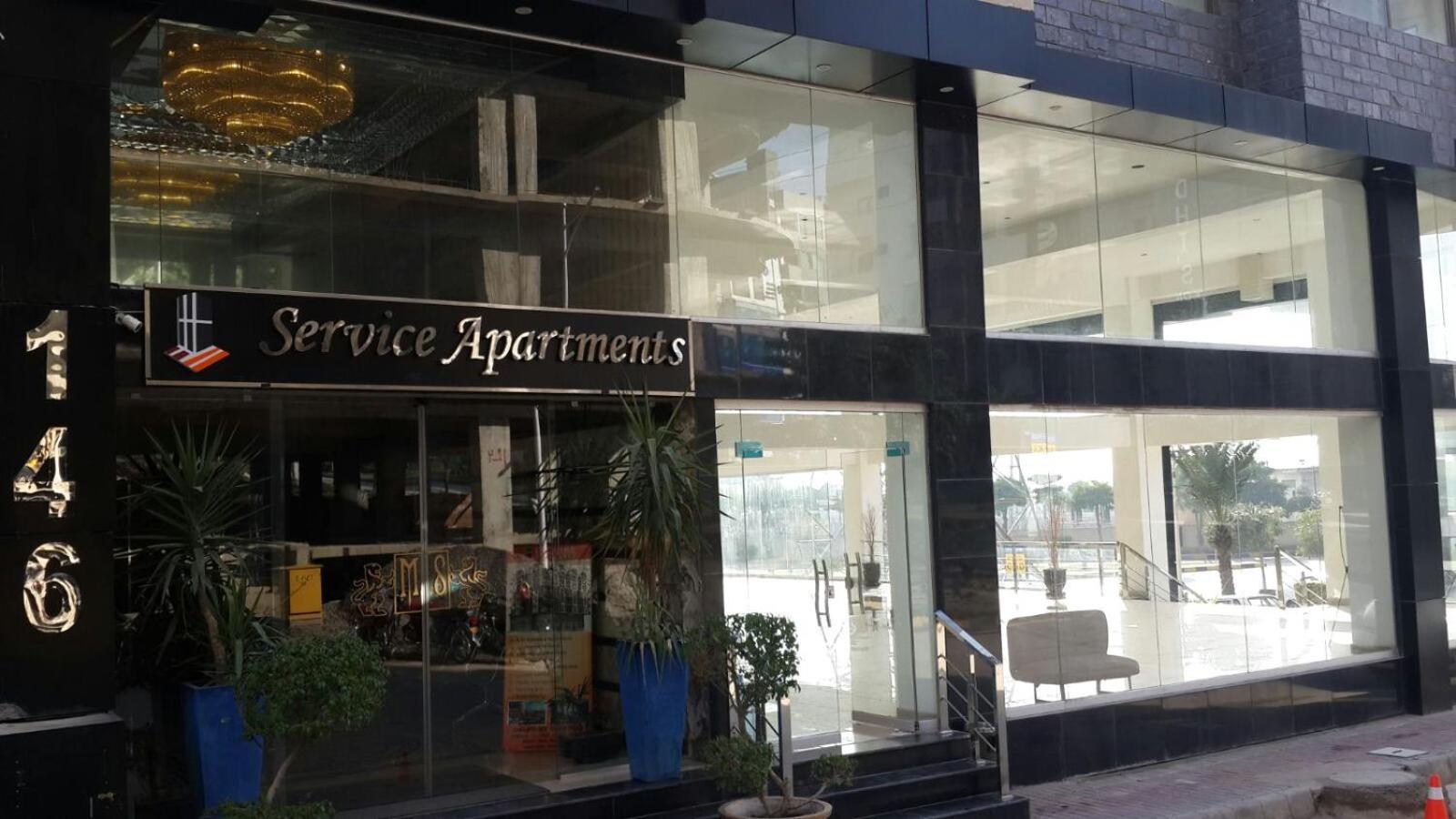 Esquire Hotels & Apartments Rawalpindi Quarto foto